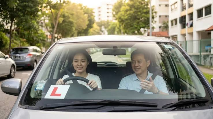 A learner driver practising with an experienced driving instructor